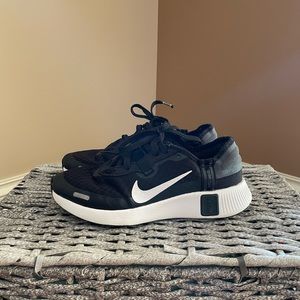 Used, youth size 4, black gym shoe
